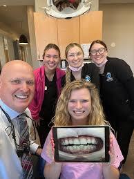 a group of people posing for a photo